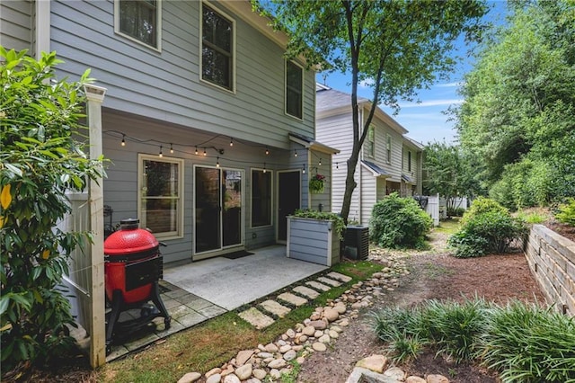 1244 Harris Commons Pl, Roswell, GA 30076 - back of property featuring a patio area