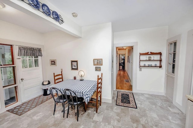 970 E Main St, Canton, GA 30114 - dining space with beamed ceiling and baseboards