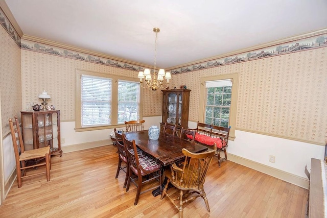 970 E Main St, Canton, GA 30114 - dining space with wallpapered walls, light wood-style flooring, and ornamental molding