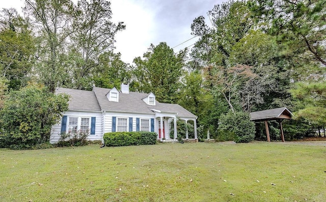 970 E Main St, Canton, GA 30114 - new england style home featuring a chimney and a front lawn