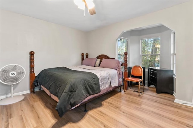 bedroom featuring ceiling fan and light hardwood / wood-style floors