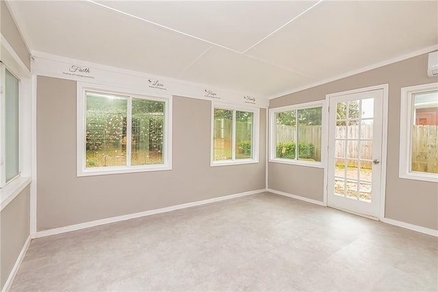 unfurnished sunroom featuring vaulted ceiling