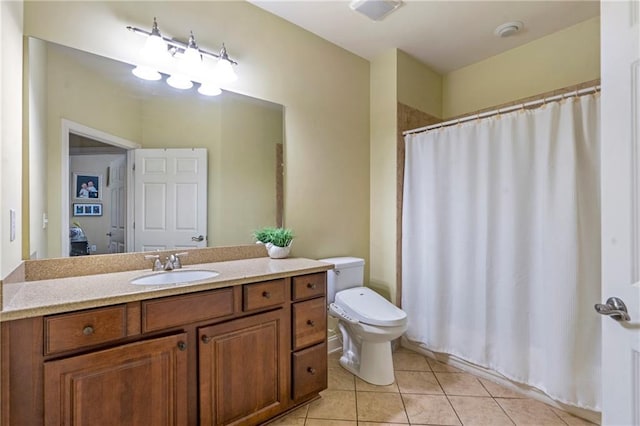 full bathroom with vanity, a shower with shower curtain, tile patterned floors, and toilet