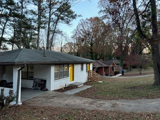 view of front of house featuring a carport