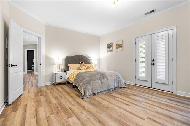 4670 Hamden Forest Dr SW, Atlanta, GA 30331 - bedroom featuring crown molding, access to exterior, light wood-type flooring, and baseboards