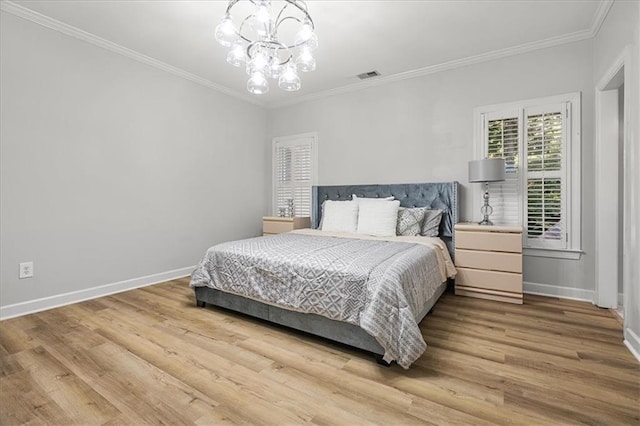 4670 Hamden Forest Dr SW, Atlanta, GA 30331 - bedroom featuring ornamental molding, baseboards, wood finished floors, and a chandelier