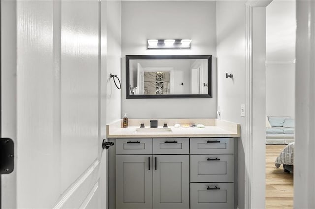 4670 Hamden Forest Dr SW, Atlanta, GA 30331 - ensuite bathroom with vanity and wood finished floors