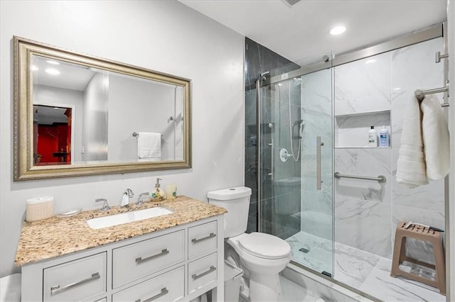 4670 Hamden Forest Dr SW, Atlanta, GA 30331 - bathroom with toilet, marble finish flooring, a marble finish shower, vanity, and recessed lighting