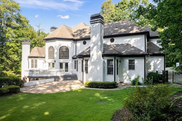 4670 Hamden Forest Dr SW, Atlanta, GA 30331 - back of property with a chimney, french doors, stucco siding, and a patio area