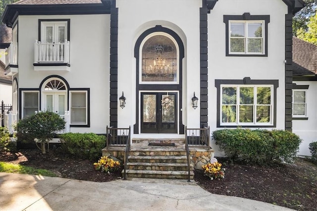 4670 Hamden Forest Dr SW, Atlanta, GA 30331 - view of front of home with french doors, stucco siding, and a shingled roof