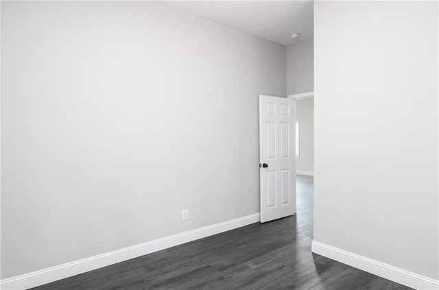 1156 Clinton Rd, Macon, GA 31211 - empty room featuring baseboards and dark wood-style flooring