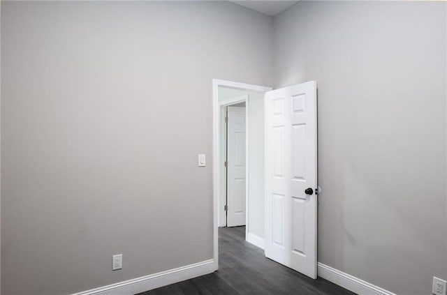 1156 Clinton Rd, Macon, GA 31211 - empty room featuring dark wood-style flooring and baseboards