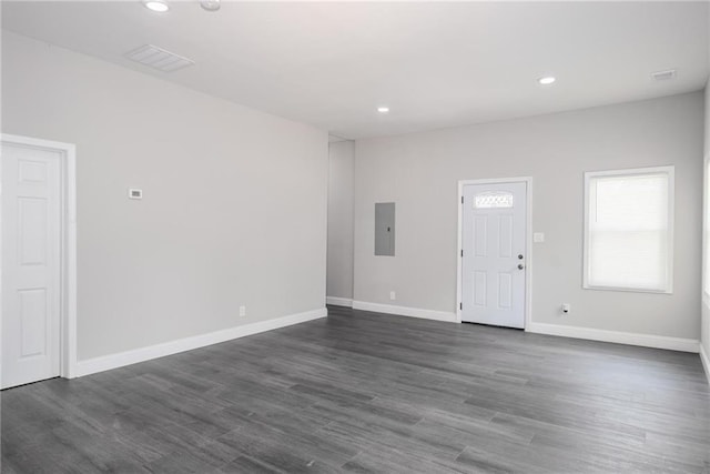 1156 Clinton Rd, Macon, GA 31211 - spare room with electric panel, dark wood-type flooring, recessed lighting, and baseboards