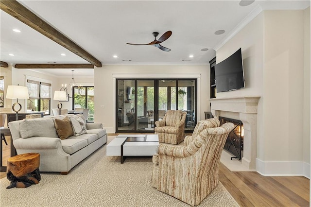 284 Hook St, Alpharetta, GA 30009 - living room with wood finished floors, recessed lighting, ornamental molding, ceiling fan, and a high end fireplace