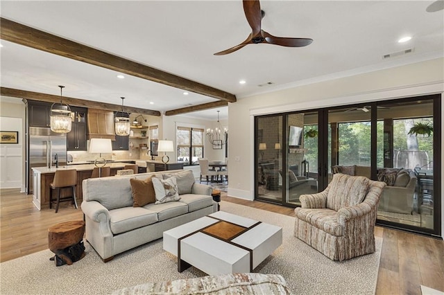 284 Hook St, Alpharetta, GA 30009 - living area featuring ceiling fan, recessed lighting, light wood finished floors, a chandelier, and beam ceiling