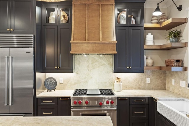 284 Hook St, Alpharetta, GA 30009 - kitchen featuring premium appliances, open shelves, custom range hood, backsplash, and glass insert cabinets