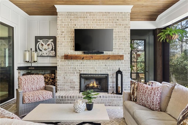 284 Hook St, Alpharetta, GA 30009 - living room with wood ceiling, a fireplace, a decorative wall, and crown molding