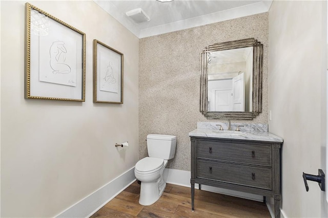284 Hook St, Alpharetta, GA 30009 - bathroom with toilet, vanity, wood finished floors, and baseboards