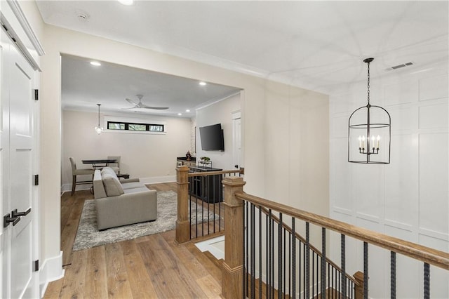 284 Hook St, Alpharetta, GA 30009 - corridor featuring an upstairs landing, a chandelier, light wood-style floors, recessed lighting, and baseboards
