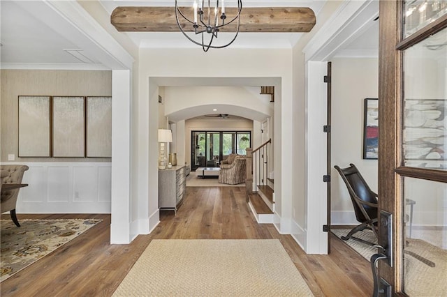 284 Hook St, Alpharetta, GA 30009 - entryway featuring arched walkways, wood-type flooring, baseboards, and crown molding