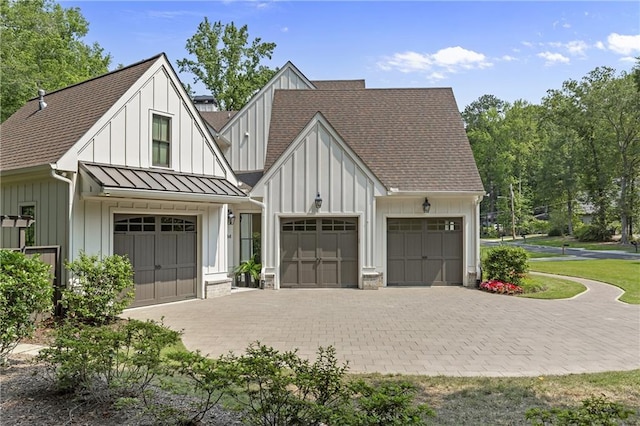 284 Hook St, Alpharetta, GA 30009 - modern farmhouse style home with board and batten siding, a standing seam roof, and a shingled roof