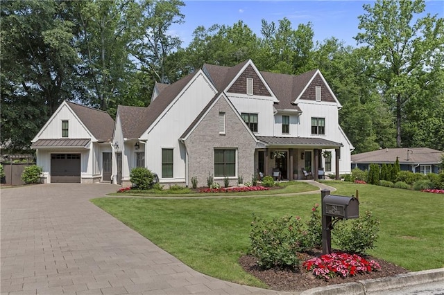 284 Hook St, Alpharetta, GA 30009 - modern inspired farmhouse with board and batten siding, a standing seam roof, and a front yard