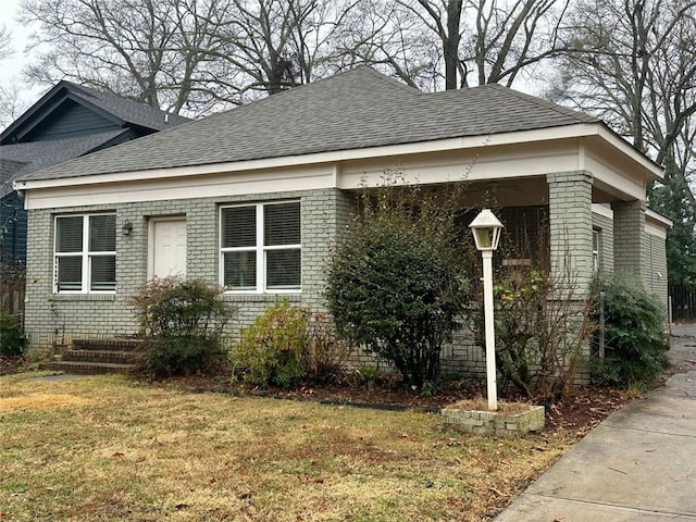 bungalow with a front yard