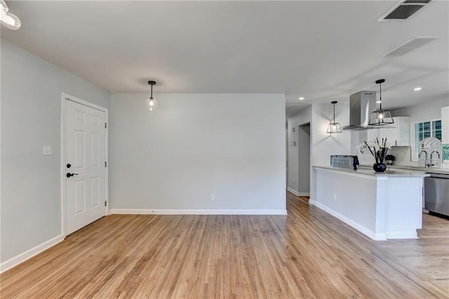 3991 Adamsville Dr SW, Atlanta, GA 30331 - unfurnished living room featuring light wood-type flooring and recessed lighting
