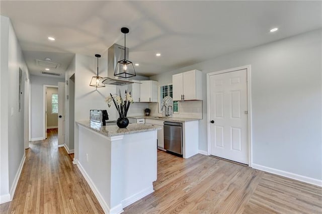 3991 Adamsville Dr SW, Atlanta, GA 30331 - kitchen with dishwasher, white cabinetry, light wood-type flooring, hanging light fixtures, and recessed lighting