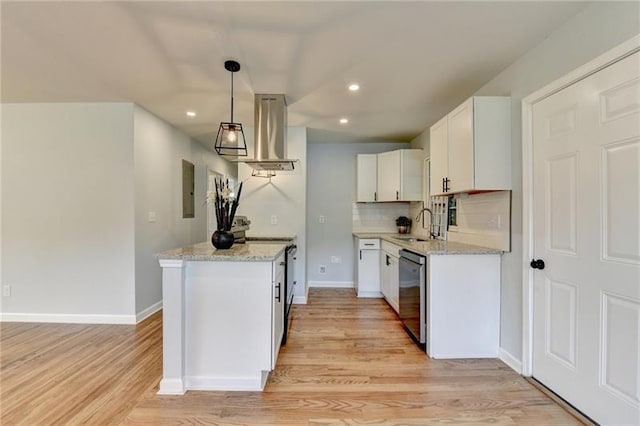3991 Adamsville Dr SW, Atlanta, GA 30331 - kitchen featuring wall chimney range hood, dishwasher, light wood finished floors, white cabinets, and recessed lighting