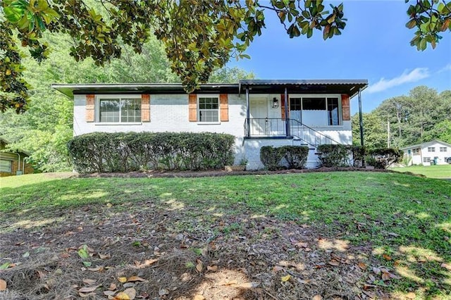 3991 Adamsville Dr SW, Atlanta, GA 30331 - ranch-style house featuring a front yard and brick siding
