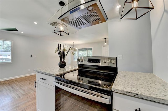3991 Adamsville Dr SW, Atlanta, GA 30331 - kitchen featuring electric stove, ventilation hood, light wood-type flooring, white cabinetry, and a chandelier