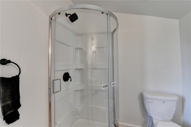3991 Adamsville Dr SW, Atlanta, GA 30331 - bathroom featuring a stall shower and toilet