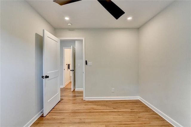 3991 Adamsville Dr SW, Atlanta, GA 30331 - empty room with light wood-type flooring, a ceiling fan, and recessed lighting