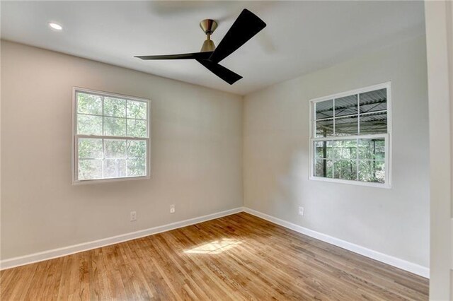 3991 Adamsville Dr SW, Atlanta, GA 30331 - empty room featuring light wood-style flooring, a ceiling fan, and recessed lighting