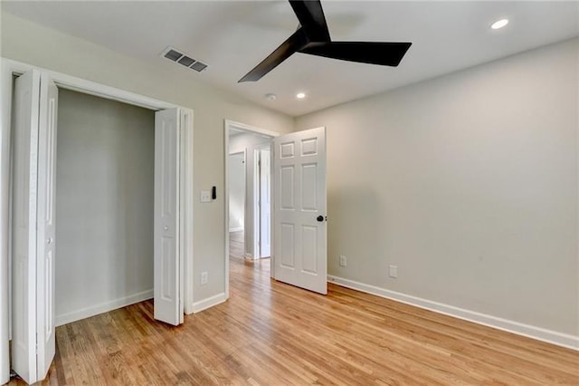 3991 Adamsville Dr SW, Atlanta, GA 30331 - unfurnished bedroom with light wood finished floors, recessed lighting, a ceiling fan, and a closet