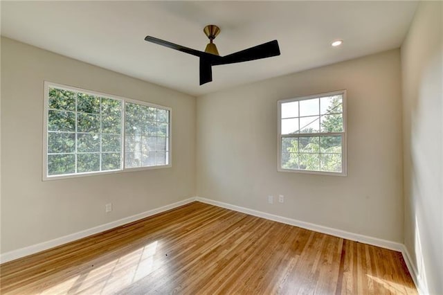 3991 Adamsville Dr SW, Atlanta, GA 30331 - unfurnished room featuring wood finished floors, a ceiling fan, and recessed lighting