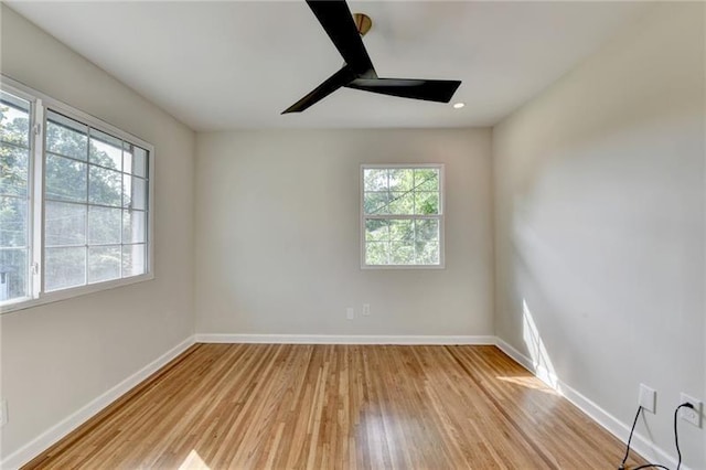 3991 Adamsville Dr SW, Atlanta, GA 30331 - spare room with light wood-style floors and ceiling fan