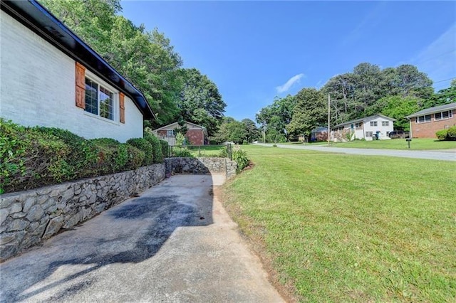 3991 Adamsville Dr SW, Atlanta, GA 30331 - view of green lawn with view of wooded area