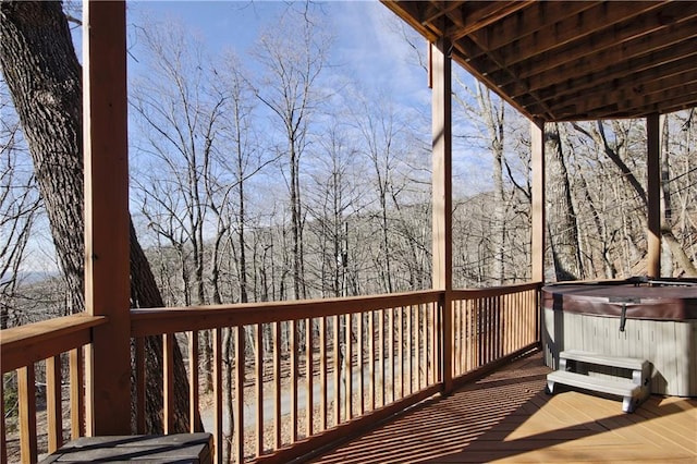 deck with a hot tub