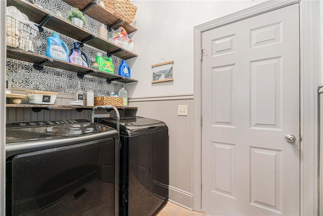 washroom featuring washer and dryer