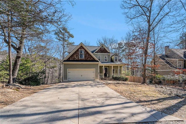 craftsman-style home featuring a garage and a porch