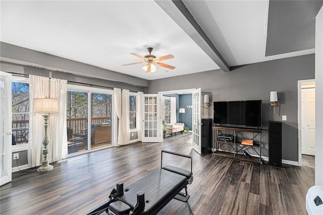 living room featuring ceiling fan, dark hardwood / wood-style floors, beam ceiling, and french doors