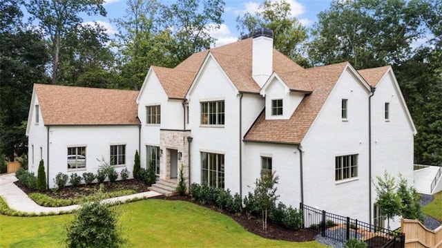 view of front of property with a front lawn