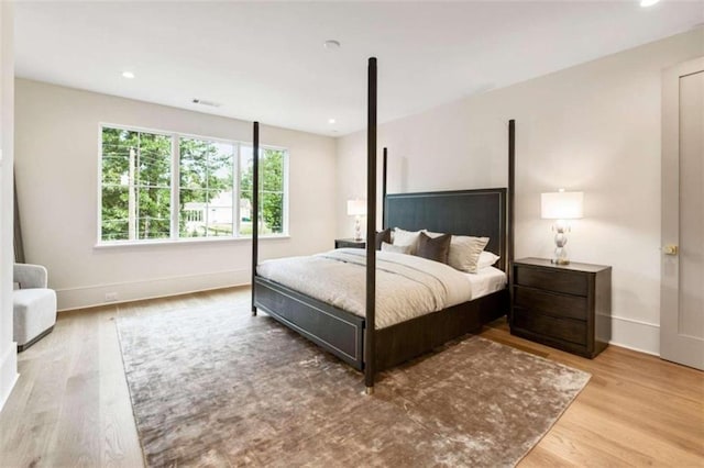 bedroom featuring light hardwood / wood-style flooring