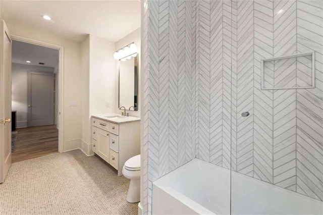 bathroom with tile patterned floors, vanity, and toilet