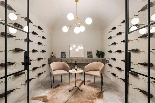 wine cellar with lofted ceiling and a notable chandelier