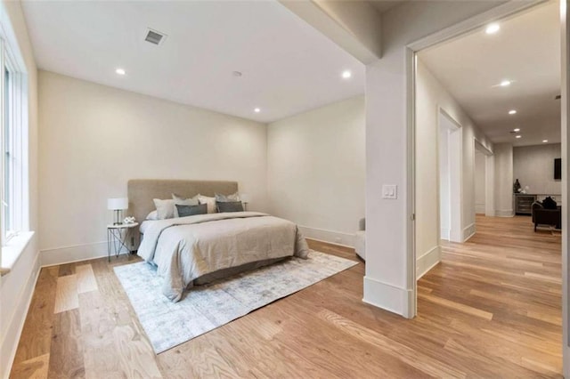 bedroom featuring light wood-type flooring