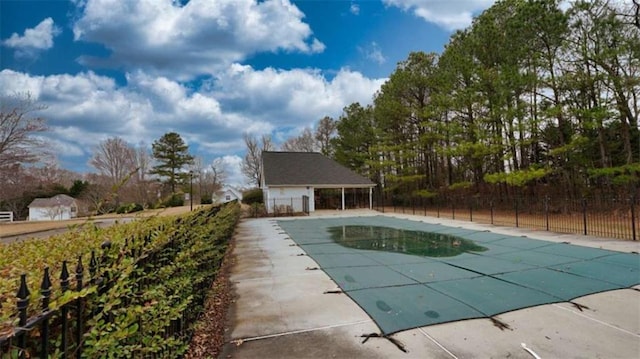 view of pool featuring a patio area, fence, and a fenced in pool