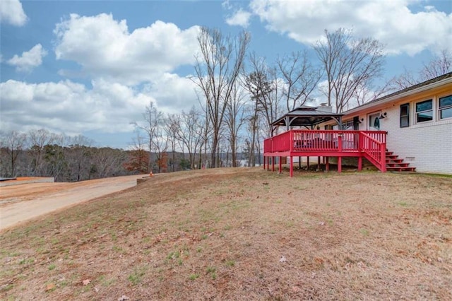 view of yard with a gazebo and a deck